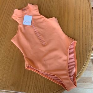 Dipping Daisy peach swim suit